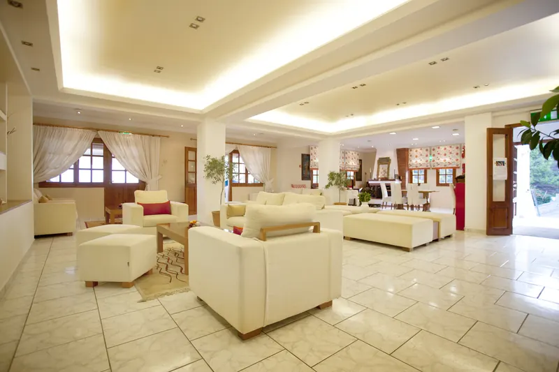 The bright lobby lounge with cream sofas